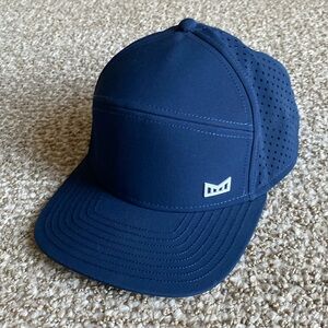 Never worn Men’s Melin golf hat